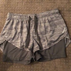 Barely worn Reebok shorts with spandex